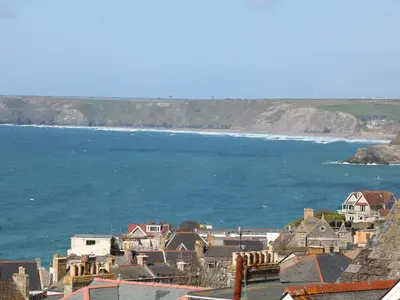 a view of a city and the ocean at An Drowes in Newquay