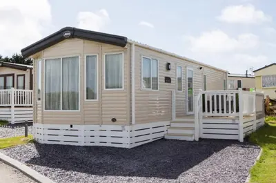 a tiny house is parked in a driveway at Blenheim, Padstow in Padstow