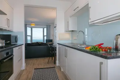 a kitchen with a sink and a counter top at SeaCrest 2 in St Ives