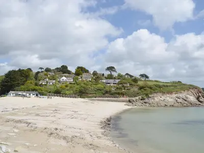 a view of a beach with houses on a hill at Florizel in Falmouth