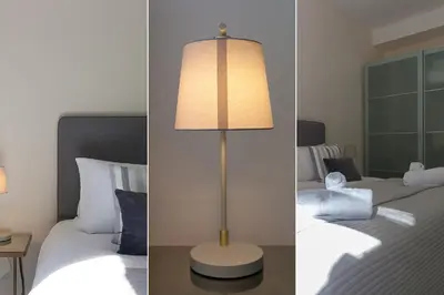 two pictures of a bedroom with a lamp next to a bed at Sea Scapes in St Ives