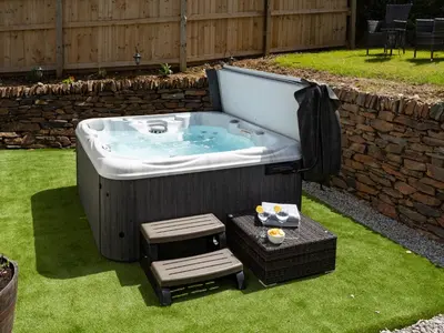 a jacuzziificialificialificialificialificialificialificialificialificialificialificial at Be Our Guest Cottage in Truro
