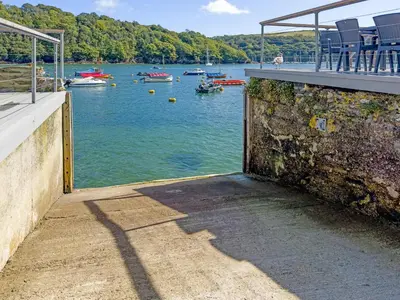 a view of a body of water with boats in it at Middle Deck in Fowey