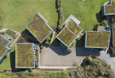 an overhead view of an estate with a group of trees at Triskel in St. Agnes