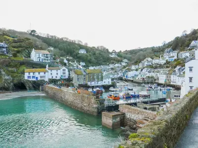 a view of a harbor with boats in the water at Smugglers Shack in Polperro
