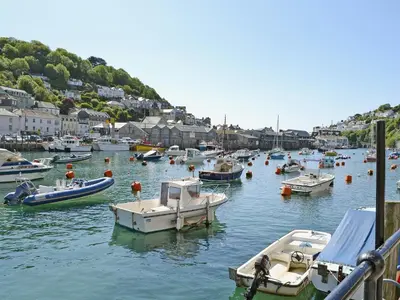 a bunch of boats are docked in a harbor at Ricann - Ukc4244 in Lanreath