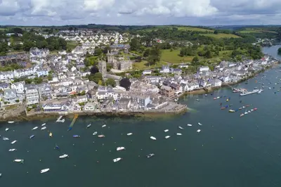 an aerial view of a town with boats in the water at Fowey Penthouse, Fowey in Fowey