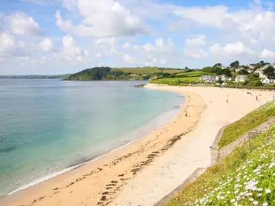 a view of a beach with people on it at The Reading Room in Falmouth