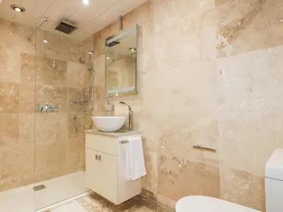 a bathroom with a sink and a toilet and a shower at Westfields in Launceston