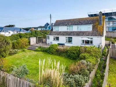 an aerial view of a house with a yard at Bella Vista in Polzeath