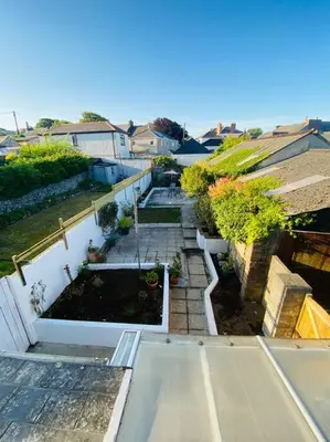 an aerial view of a garden on a house at Beautiful 2 bed end terrace Victorian town house in Redruth