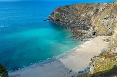 an aerial view of a beach next to the ocean at Kerensa in Portreath