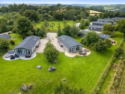 an aerial view of a home with a yard at 7 Faraway Fields in Liskeard