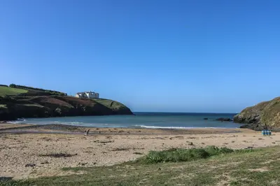 a beach on the coast of ireland at Pol Glas Hall in Helston