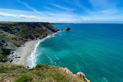 an aerial view of the ocean and a beach at Shore Edge in Portreath