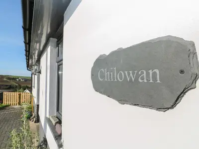 a sign on the side of a building at Chilowan in Tintagel