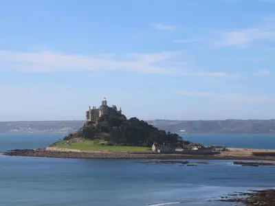 a castle on an island in the water at Greenside Studio in Penzance